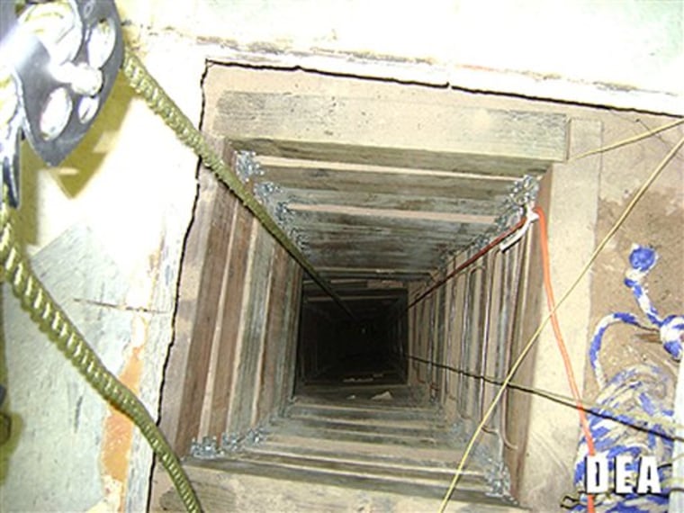 The DEA took this photo of a tunnel shaft entrance on the U.S. side of a 240-yard, complete and fully operational drug smuggling tunnel that ran from a small business in Arizona to an ice plant on the Mexico side of the border.